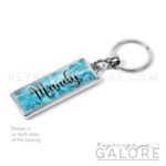 aquamarine birthstone silver plated metal keyring with personalized name in black font