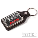 audi 4 circles leather look keyring featuring the audi logo