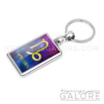 silver plated metal key ring key chain featuring the capricorn logo in gold