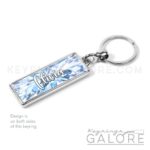 diamond birthstone silver plated metal keyring with personalized name in white font