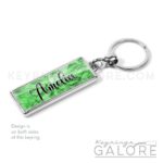 emerald birthstone silver plated metal keyring with personalized name in black font