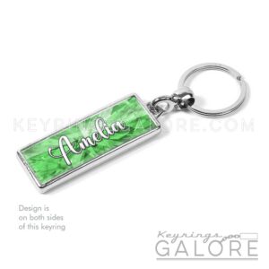 emerald birthstone silver plated metal keyring with personalized name in white font