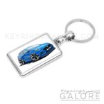 ford puma 2025 in desert island blue encased inside a metal keyring