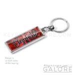 garnet birthstone silver plated metal keyring with personalized name in black font