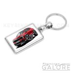 2025 kia sportage in red encased in a metal keyring