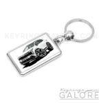 2025 kia sportage in white encased in a metal keyring